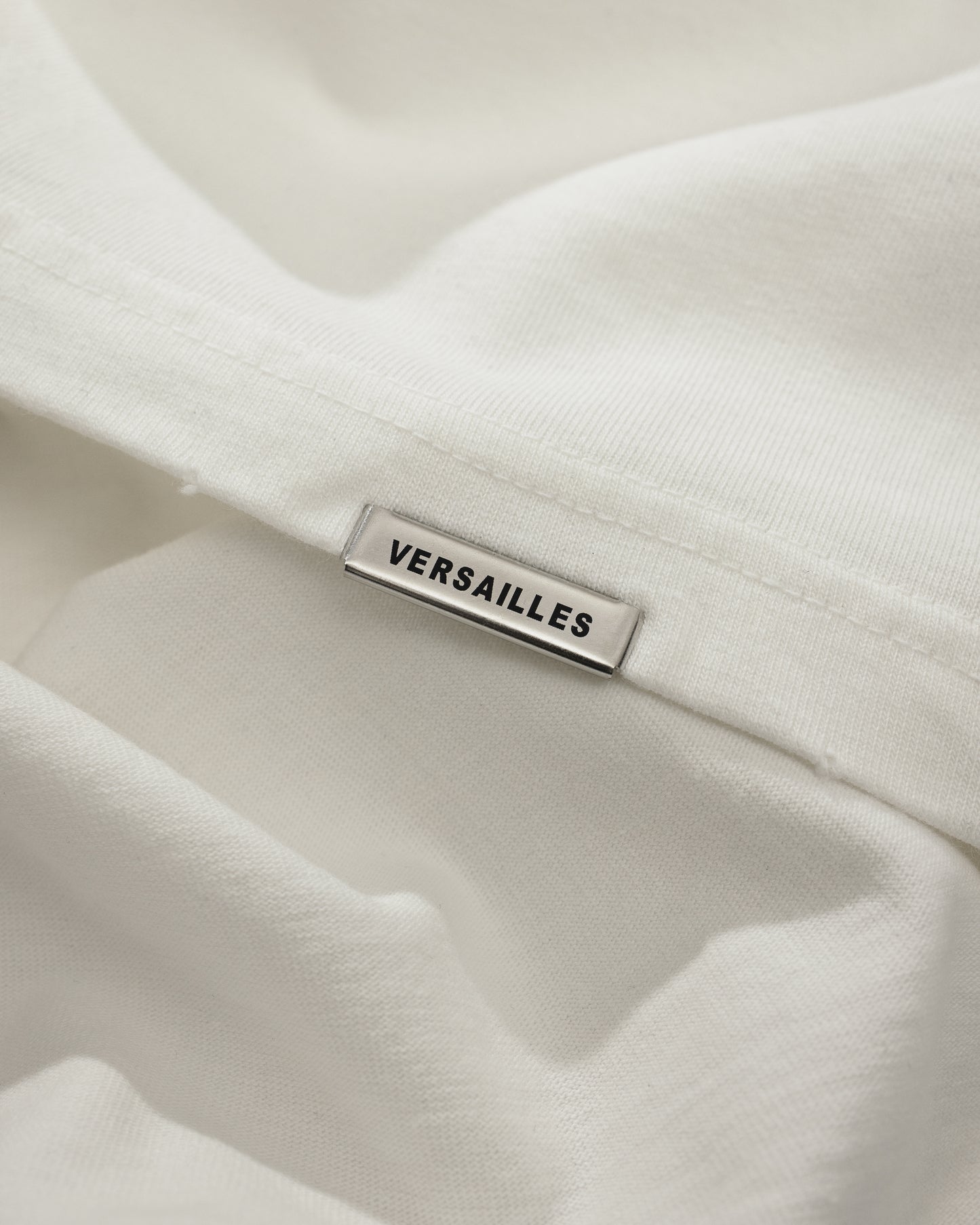 MINIMALISM SIGNATURE TEE - DISTRESSED OFF WHITE